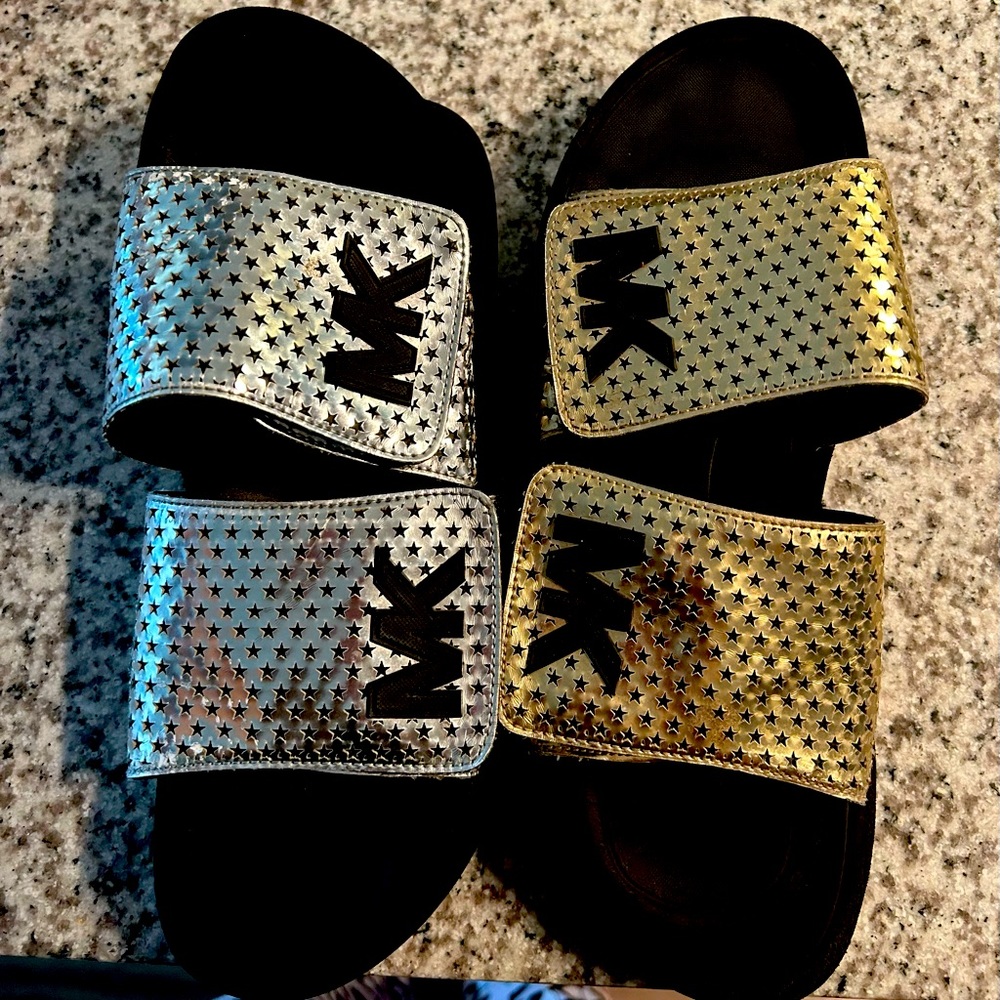 Micheal Kor slides